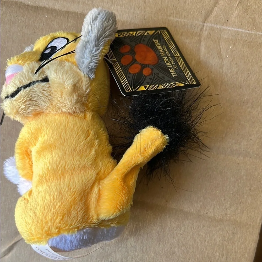 Yellow and Gray Stuffed Animal Toy